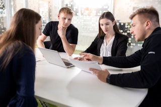 Students and Engineers in a meeting