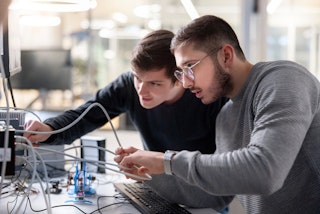 Apprentices building something